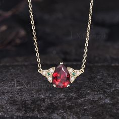 Item description ✦ Handmade, high-quality item! ✦ Material: 925 sterling silver, Solid 14K/18K GOLD (can be made in white/rose/yellow gold), Platinum ✦ Center Stone: 7x9mm Pear Cut Lab Ruby ✦ Side Stones: Round Cut Moissanites and Lab Emeralds ✦ Chain length can be adjusted between 16 inches and 18 inches As it is handmade, it needs 2-4 weeks to finish and then be shipped by USPS or FedEx. Return policy: We offer 30 days return policy. For any reason, if you are not completely satisfied with you Anniversary Necklace, Ruby Wedding, Ruby Necklace, Emerald Pendant, Necklace Unique, Rose Yellow, July Birthstone, Pear Cut, Unique Necklaces