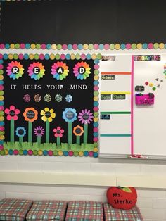 a bulletin board that says read it helps your mind with flowers and words on it