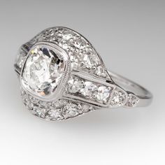 an antique style diamond ring with two rows of diamonds