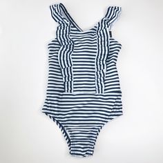 Beautiful Gap Baby Navy & White Swimsuit Gorgeous Ruffle Detail Two Sizes: 18-24 Months Toddler, 2 Yrs Toddler 18-24 Months 31-33 In 27-30 Lbs 2 Yrs Toddler 33-36 In 30-33 Lbs Shell: 82% Polyester, 18% Elastane/Spandex Lining: 100% Polyester U/V Protection 40+ Machine Washable White Summer One-piece With Ruffles, White Summer One Piece With Ruffles, White Ruffled One-piece For Summer, White Ruffled Summer One-piece, White Ruffled Summer One Piece, White Ruffled Swimwear For Play, White Ruffled One-piece Swimsuit, Casual White Ruffled Swimwear, Blue Summer Bodysuit For Playwear