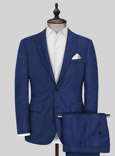 If showing off your individual style and personal panache is what you want then opt for our restrained and classy Caccioppoli Sun Dream Amicci Royal Blue Wool Silk Suit. Crafted from wool and silk, the Super 150's wool suit showcases a wonderful pattern that will add some texture to your look. Pair it with a matching waistcoat, a crisp white shirt, green tie and black dress shoes.  Look Includes  Caccioppoli Sun Dream Amicci Royal Blue Wool Silk Fabric  Two Button Jacket Style  Notch Lapel  Horn Royal Black Buttons  Single Vent  Three Cuff Buttons  Two Welted Back Pockets on Trousers   You can change the look during customization if required.  Lining: Viscose, Dry Clean. Blue Elegant Formal Sets, Elegant Blue Formal Sets, Elegant Blue Suiting Fabric Sets, Semi-formal Fitted Silk Three-piece Suit, Semi-formal Elegant Wool Set, Fitted Blue Suit For Evening, Classic Silk Sets For Semi-formal Occasions, Formal Blue Custom Fit Sets, Blue Silk Suits For Wedding