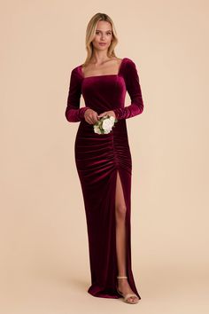 a woman in a long velvet dress