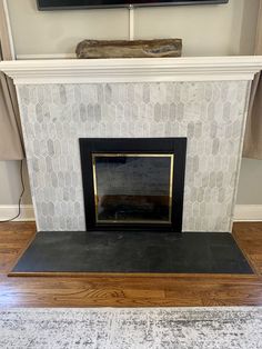 the fireplace is clean and ready for us to put in their new home's living room