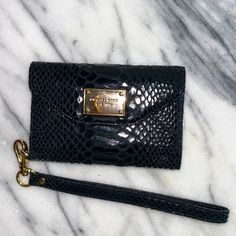 Michael Kors Black Python Clutch Wallet Phone Genuine Leather Msrp $80. Excellent Condition/Nwot Black Pouch Clutch With Card Slots, Michael Kors Wallet With Mobile Phone Bag, Michael Kors Elegant Clutch Wallet, Elegant Michael Kors Clutch Wallet, Black Wristlet With Card Slots For Daily Use, Black Rectangular Wristlet With Card Slots, Michael Kors Rectangular Clutch For Travel, Black Clutch Wallet With Mobile Phone Bag, Black Wristlet With Card Slots For Everyday Use