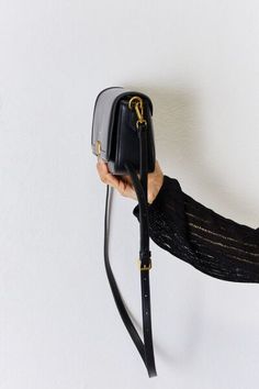 This vegan leather crossbody bag is an elegant and practical accessory. Made from high-quality material, it is easy to clean and comes with an adjustable strap for hands-free carrying. It is perfect for any occasion, whether it's work, errands, or a night out. Bag size: Small Material: 100% Vegan leather Imported Product measurements: 9.4*3*6 in POLYBAG 30% RECYCLED MATERIAL Denim Jewelry, Black Leather Crossbody Bag, Handbag Shoes, Stylish Bag, Black Cross Body Bag, Creamy White, Stylish Accessories, Crossbody Strap, Leather Material