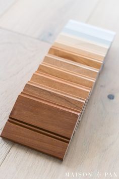 a wooden floor with different shades of wood on it's sides and the top part showing