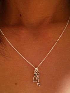 "Horse Necklace - Equestrian Necklace - Stirrup Necklace - Snaffle Bit Jewelry - Equestrian Jewelry - Horse Jewelry - Horse Lover Gifts *Sterling Silver * Stirrup is 1/2\" by 1/4\" * Snaffle Bit is 1/8\" by 5/8\" * 16\" Sterling Silver * 17\" -19\" Adjustable Black Cord. We have recreated this classic look in to our earrings and pendants.this is for the pendant only Bit earrings: https://etsy.me/3dkhWRg Stirrup Earrings: https://etsy.me/3nGuFm4 I guarantee all my sterling silver pieces to be gen Stirrup Necklace, Horse Lover Gifts, Equestrian Necklace, Snaffle Bit, Equestrian Jewelry, Horse Necklace, Horse Jewelry, Gifts For Horse Lovers, Silver Pieces