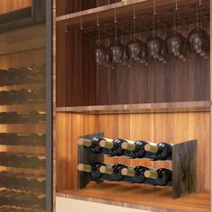 a wine rack with many bottles in it