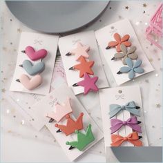 some little cards with bows and hearts on them