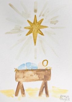 a watercolor painting of a baby jesus in the manger with a star above it