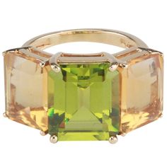 18kt yellow gold Emerald Cut ring with peridot (approximately 5 cts) and citrine (approximately 4 cts each). The Ring measures approximately 1 " across and 1/2" in height. The Emerald cut Ring can me made with any stone combinations. The Ring Can be sized or made to order. Best, Christina Addison Jewelry NYC Gold Emerald Cut Ring, Emerald Cut Ring, Garnet And Diamond Ring, Gold Topaz, Emerald Cut Rings, Semi Precious Jewelry, Peridot Stone, Colored Stone, Pink Topaz