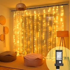 an image of a room with lights on the wall and a phone next to it