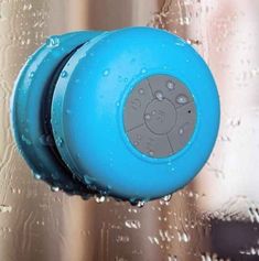 a shower head with water droplets on it