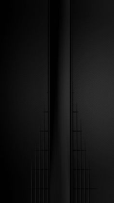 an abstract black and white background with vertical lines in the bottom right corner, on top of each other