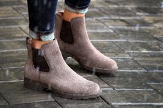 There’s everything to love about this Chelsea boot built for rainy days. Waterproof Suede Winter Boots, Waterproof Suede Boots For Winter, Winter Suede Waterproof Walking Boots, Winter Waterproof Suede Boots For Walking, Suede Waterproof Boots For Winter Walking, Winter Suede Waterproof Boots For Walking, Waterproof Suede Boots With Suede Lining, Suede Waterproof Ankle Boots With Suede Lining, Winter Chelsea Boots With Suede Lining And Round Toe