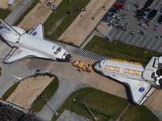 an aerial view of a space shuttle on display