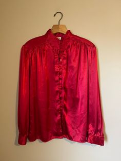 Vintage red polyester blouse size 8.  fits medium and large is not real busty.  arm pit= 23 length = 27 Chic Red Blouse For Evening, Red Long Sleeve Blouse For Evening, Red Fitted Top For Formal Occasions, Elegant Red Blouse For Night Out, Chic Red Blouse For Night Out, Red Formal Summer Tops, Red Formal Tops For Summer, Fitted Red Vintage Blouse, Fitted Red Blouse