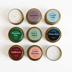 six different types of candles sitting next to each other