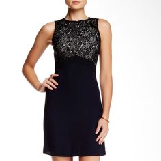 Black And Navy A.L.C. Sleeveless Mini Dress With Lace Detail Throughout Top, Crew Neck And Concealed Zip Closure At Center Front And Left Side. Details Size 4 (No Tag Is Included) Size Guide Bust: 32" Waist: 26" Hip: 35" Length: 34" Fabric: 100% Polyester; Contrast 58% Viscose, 42% Acetate Size 8 Bust: 32.5" Waist: 28.5" Hip: 31" Length: 34.75" Fabric: 100% Polyester; Combo 58% Viscose, 42% Acetate Inv. #1992 Black Dress Floral, Silk Shirt Dress, Long Sleeve Wrap Dress, Mock Neck Dress, Linen Mini Dress, Long Sleeve Shift Dress, Flare Mini Dress, Silk Mini Dress, Metallic Dress