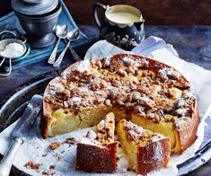 a cake on a plate with one slice cut out and ready to be eaten,