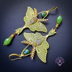 Luna Moth opal earrings with shimmers wings, made from high-quality colourful polymer clay, colours do not wash out and do not fade in the sun, decorated by Ethiopian opal cabochons, Swarovski crystals and glass beads. Single copy,100% Handmade OOAK earrings. All items are shipped from my home within 1-3 business days after payment confirmation. Please, contact me with any questions. I make some custom orders. If you would like some items to be custom made or created for you in a special way, fe Elegant Green Resin Earrings, Bohemian Green Polymer Clay Earrings, Green Bohemian Polymer Clay Earrings, Unique Green Butterfly Earrings, Elegant Hand Painted Green Earrings, Bohemian Green Butterfly Jewelry, Green Bohemian Butterfly Jewelry, Green Butterfly Nature-inspired Jewelry, Whimsical Green Jewelry