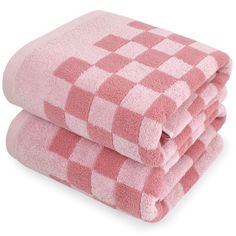 three pink checkered towels stacked on top of each other