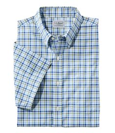 Customers love the high-quality craftsmanship of our wrinkle free button down shirt, which gives you all the comfort of cotton, with none of the wrinkles. Traditional Fit: Relaxed through the chest, sleeve and waist. 100% cotton poplin. Fine 80s two-ply fabric for longer wearability. Features wrinkle-free performance that won't wash out. Our innovative TrueCool fabric wicks moisture away from your skin and helps it dry quickly. Machine wash and dry. Buttoned collar. Front pocket. Imported. Check Dress Shirt, Wrinkle Free, Cotton Poplin, Sports Shirts, Workout Shorts, Fabric Care, Button Down Shirt, Short Sleeves, Mens Shirts