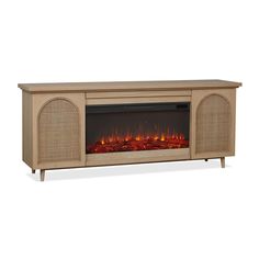 an entertainment center with a fire place and wicker doors on the sides, in front of a white background