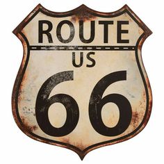 an old rusted route 66 sign with the word route us in black and white