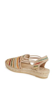 A cushy insole extends the everyday comfort of a breezy espadrille flat featuring a slingback strap and elasticized cords to perfect the fit. 1 1/4" heel; 3/4" platform (size 39) 3" strap height Slip-on style Textile upper and lining/synthetic sole Made in Spain Women's Shoes Woven Slip-on Espadrilles, Multicolor Slip-on Espadrilles For Vacation, Embroidered Slip-on Espadrilles For Beach, Textile Slip-on Espadrilles With Woven Sole, Multicolor Summer Slip-on Espadrilles, Flat Espadrilles, Sandal Espadrille, Womens Flats, Women's Shoes