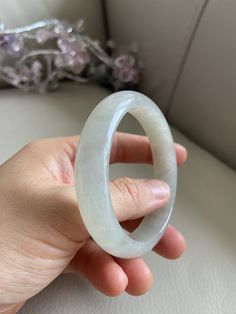 "🌈 Jade Bangle 57.3mm (2.25\"), Round Shape, Light Green 🌷 Untreated Natural Jadeite/ Grade A Jade/ Certified 🌷 Jade from Myanmar/ Burma 🌷 100% handmade carving 🌷 Inner diameter : 57.3mm / 2.25\" 🌷 Shape : Round 🌷 Color : Light Green 🌷 Free standard shipping from Hong Kong with tracking included 🌷 Take approximately 7-21 days to arrive worldwide ❤️ In Chinese Culture: Young people wear jade pendant will have a prosperous life, attracts good luck and friendship Old people wear jade penda Lavender Green, Jade Bangle, Gemstones Jewelry, Good Marriage, Jade Pendant, Chinese Culture, 21 Days, Myanmar, Photo Jewelry