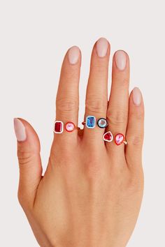 Make a statement day or night. This ring adds the perfect amount of sparkle to any occasion. Features a rectangular and round lab-created gemstone with contrasting colored enamel. Modern Gemstone Party Rings, Modern Multi-stone Rings, Modern Rectangular Rings With Accent Stones, Modern Enamel Ring For Anniversary, Modern Ring With Rectangular Accent Stones, Modern Rings With Rectangular Accent Stones, Gemstone Enamel Ring, Modern Multi-stone Rectangular Jewelry, Modern Enamel Jewelry With Gemstone