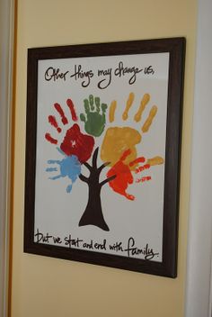 this is an image of a family tree with handprints on the front and back