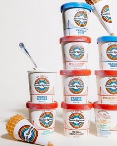 several ice cream cups stacked on top of each other