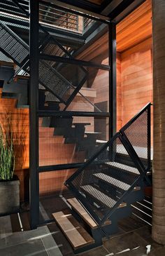 the stairs are made of metal and wood