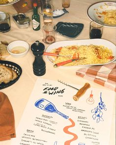 a table topped with lots of different types of food