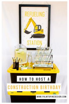 a construction themed birthday party with yellow and black decor, including drinks on the table