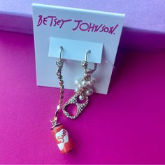 Nwt Betsey Johnson Mismatched Soda Pop Can & Pull Tab Pearl Bubbles Earrings Guranteed Authentic Betsey Johnson New With Tags Details Whimsical Mismatched Drop Earrings Featuring Soda Can Dangling From A Mutli Colored Rhinestone Chain On One Side, The Other Side Has Gold Soda Pull Tab With Silver Rhinestones On Front Side Hanging From A Chain Of Pearl "Bubbles." Earrings Have A Post Back Closure. Made From Metal, Glass And Enamel. Metal/Glass/Enamel Post Back All Jewelry Ships In Beautiful Gift Betsey Johnson Sunglasses, Rhinestone Halloween, Gold Star Earrings, Bubble Earrings, Spider Earrings, Cat Earrings Studs, Pop Cans, Ghost Earrings, Rhinestone Chain