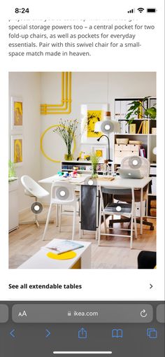 an image of a table and chairs in a room with yellow accents on the walls