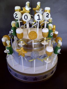 a cake decorated with beer and gold decorations