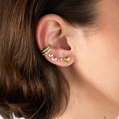 Description: * NO PIERCING NEEDED *14K gold & 0.16 ct diamonds. *This edgy ear cuff adds a twist to everything. Its shiny spark is an eye-catcher. It is sexy and cute. Fits the office or to a full day of hanging at the beach without even noticing you are wearing it. Anniversary Diamond Accents Ear Cuff In Fine Jewelry Style, Diamond Ear Cuff With Accents For Anniversary, Diamond Ear Cuff With Diamond Accents For Anniversary, Diamond Ear Cuff For Anniversary, Fine Jewelry Diamond Ear Cuff For Anniversary, Fine Jewelry Ear Cuff With Diamond Accents, Fine Jewelry Cubic Zirconia Ear Cuff With Diamond Accents, Cubic Zirconia Ear Cuff With Diamond Accents, Yellow Gold Cubic Zirconia Ear Climbers With Prong Setting