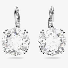 Swarovski Millenia Clear Round Cut Dropper Earrings 5628351 are crafted from base metal with silver rhodium plating. These elegant earrings will make a timeless addition to your everyday repertoire. Featuring a round-cut, dazzling white Swarovski crystal set in double four claws. Style these earrings with denim, eveningwear, or sharp tailoring, anything goes. Dimensions: Length: 2 cm. Width: 1 cm. Swarovski Millenia, Crystal Jewelry Earrings, Earrings Round, Thomas Sabo, Swarovski Earrings, Swarovski Jewelry, Crystal Drop Earrings, White Crystal, Accessories Jewelry Earrings