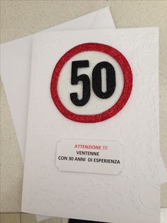 a close up of a greeting card with a number 50 on the front and back