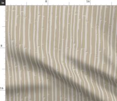 a beige and white striped fabric with vertical stripes