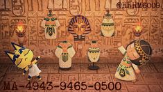 an image of egyptian statues on display in front of a wall with candles and numbers