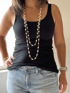 "Landon's Pearls are aptly named after my beautiful and whimsical son. These are such a classic and timeless piece of jewelry to add to your wardrobe. You can wear them down with jeans and a t-shirt or for a night out. I love the natural and unique shapes that freshwater pearls come in. The colored rhinestones added a sense of whimsy to these pieces. Choose between 36\" or 80\". They look gorgeous stacked with other jewelry. Featuring freshwater pearls and multicolored cubic zirconia jewels and Everyday Wire Wrapped Necklaces, Everyday White Wire Wrapped Jewelry, Everyday Pearl Jewelry Wire Wrapped, Baroque Pearl Lariat Necklace With Pearl Charm, Chic Multi-strand Pearl Chain Necklace, Multi-strand Pearl Necklace With Adjustable Chain, Adjustable Bohemian Multi-strand Pearl Necklace, Luxury Multi-strand Pearl Necklace With Pearl Chain, Multicolor Pearl Necklace