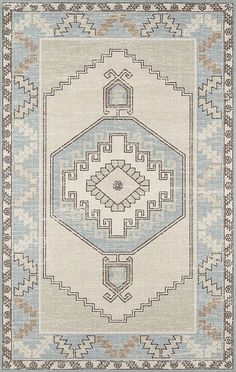 a blue and beige rug with an intricate design