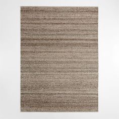 an area rug with brown and beige stripes