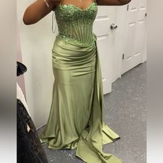 Color: Green Size:12 Never Worn Outside, Only Time Being Worn Was Trying On Still In Bag Bought For $390 Olive Green Prom Dress Long, Light Green Dresses, Sage Green Prom, Olive Green Prom Dress, Light Green Prom Dress, Sage Green Prom Dress, Green Prom Dress Long, Light Green Dress, Sheer Corset