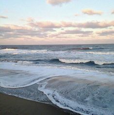 the waves are coming in to the beach and there is no image on this page